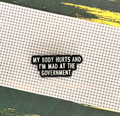 My Body Hurts and I'm Mad at the Government Needle Minder