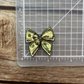 Money Bow Needle Minder